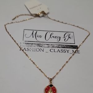 Doublr Sided Gold and Red Pendant Necklace
